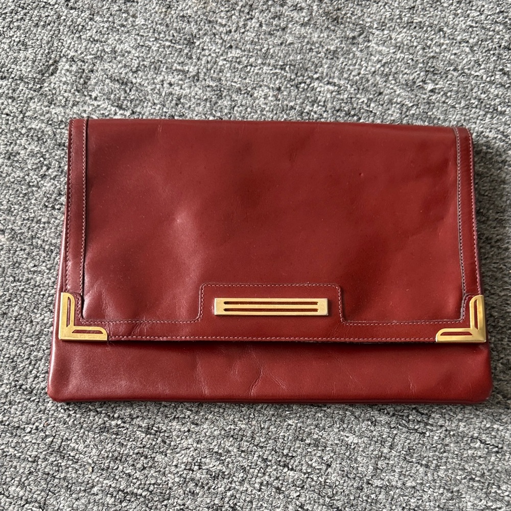 1970s leather clutch Philippe with Gold Accents